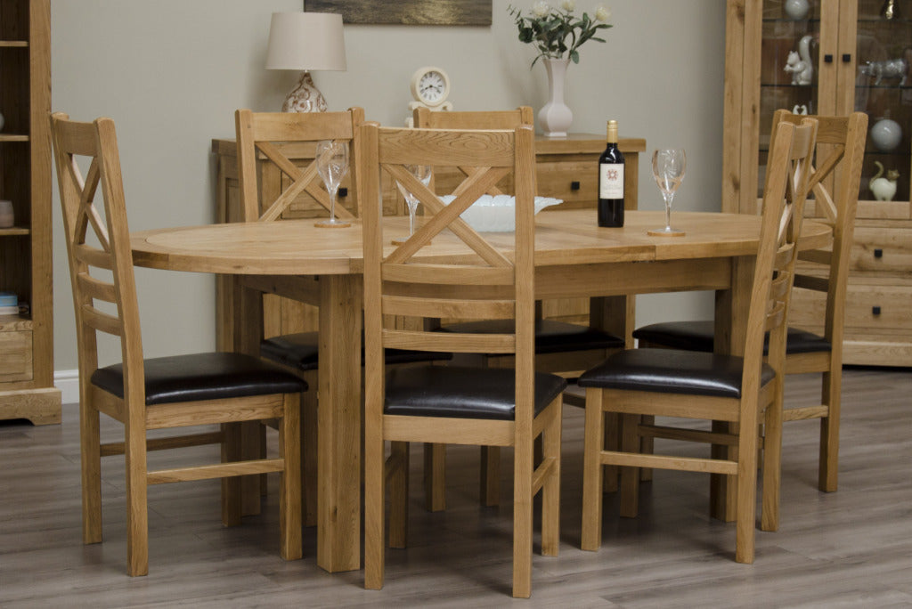 Deluxe_Oval_Extending_Dining_Table_._100_Solid_Oak