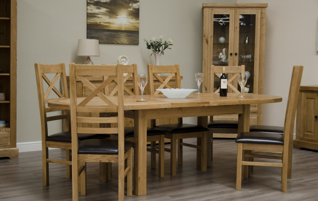 Deluxe_Oval_Extending_Dining_Table_._100_Solid_Oak