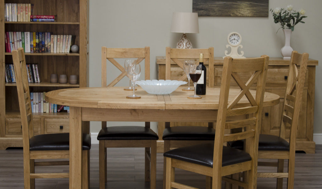 Deluxe_Oval_Extending_Dining_Table_._100_Solid_Oak