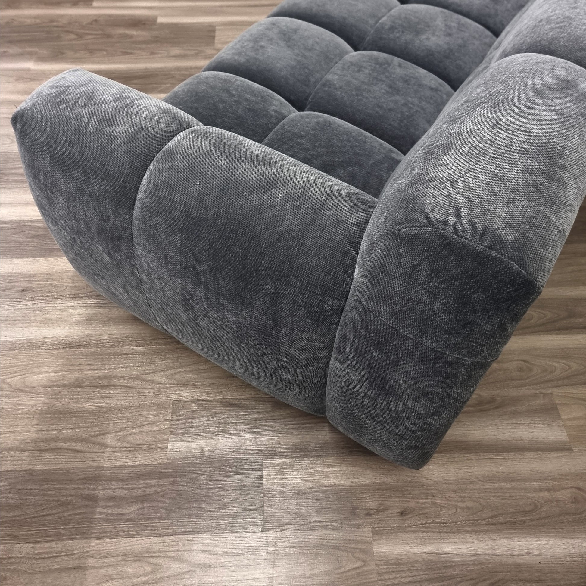 close up view of the Aluxo Harlem Grey Steel Velvet 4 seater Sofa in bubble sofa style