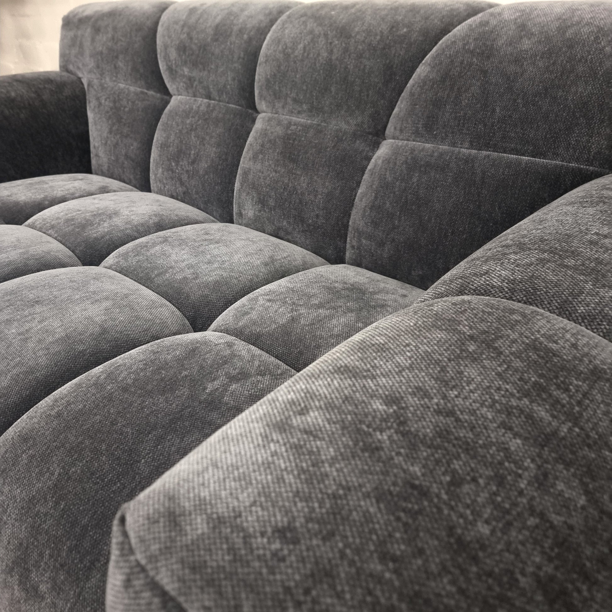 close up view of the Aluxo Harlem Grey Steel Velvet 3 seater Sofa in bubble sofa style.